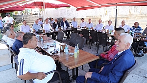 GÜRKAN, MUHTARLAR VE ŞEHİT AİLELERİYLE BAYRAMLAŞTI