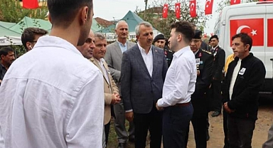 TAVLI'NIN CENAZESİNE KATILDI