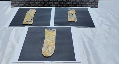 Çantasında külçe altın yakalandı