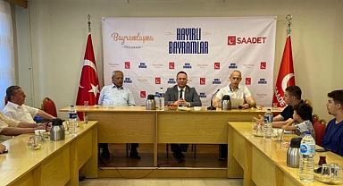 Tekin, partisinin bayramlaşma programına katıldı
