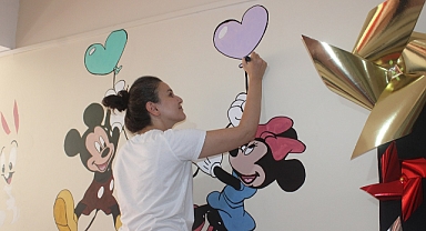 Çalıştıkları ilkokulun duvarlarını renklendirdi